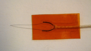 Reinforcement with kapton tape (R)